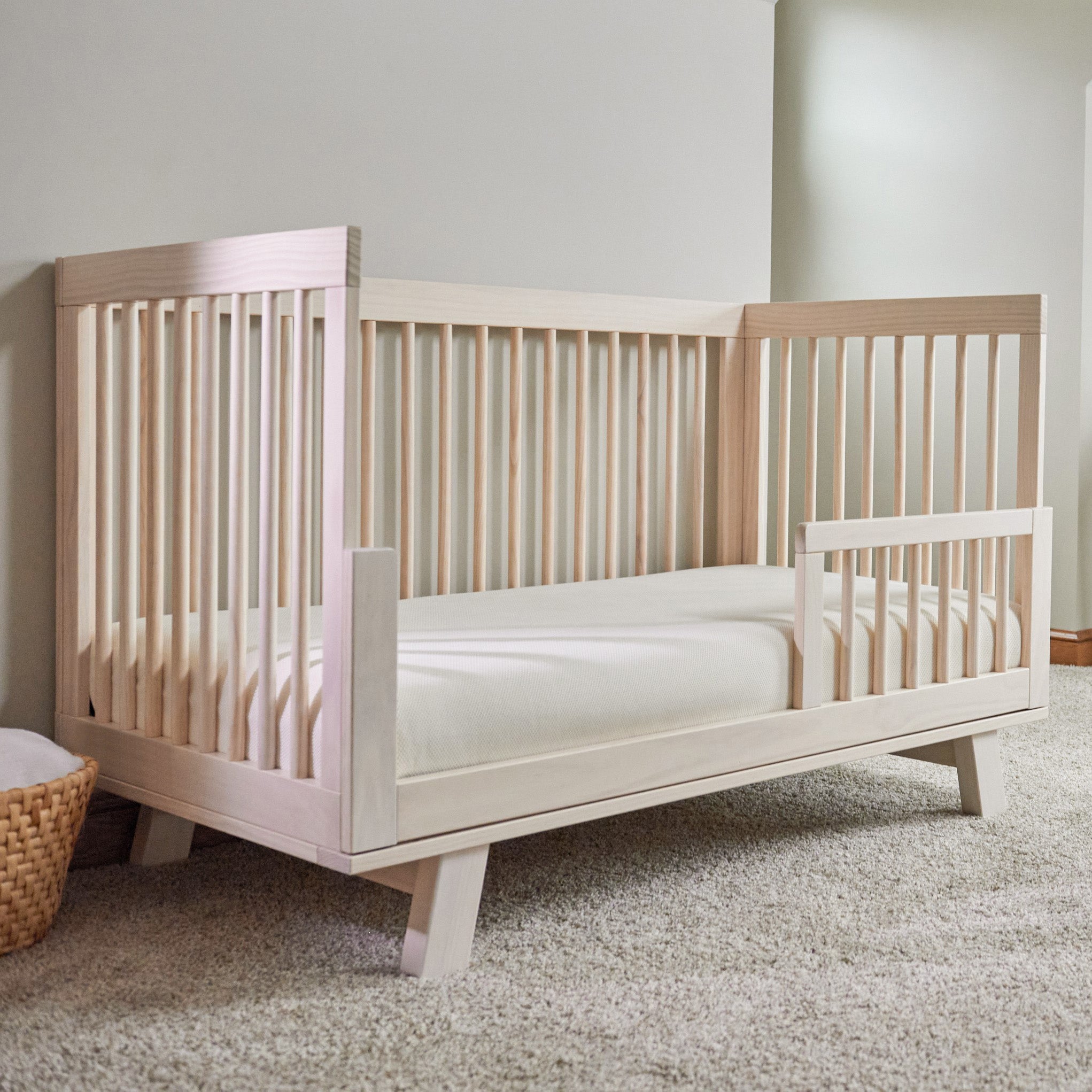 Room view mattress in crib Naturepedic Organic Breathable Baby Crib Mattress (2-Stage)